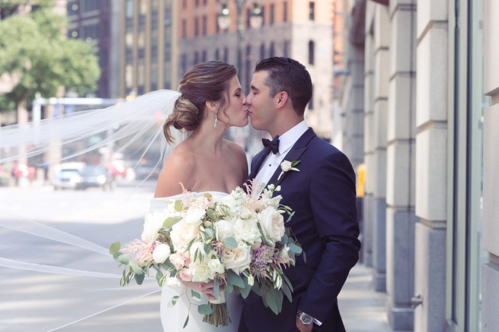 detroit wedding kiss, simply brilliant events, swooping veil