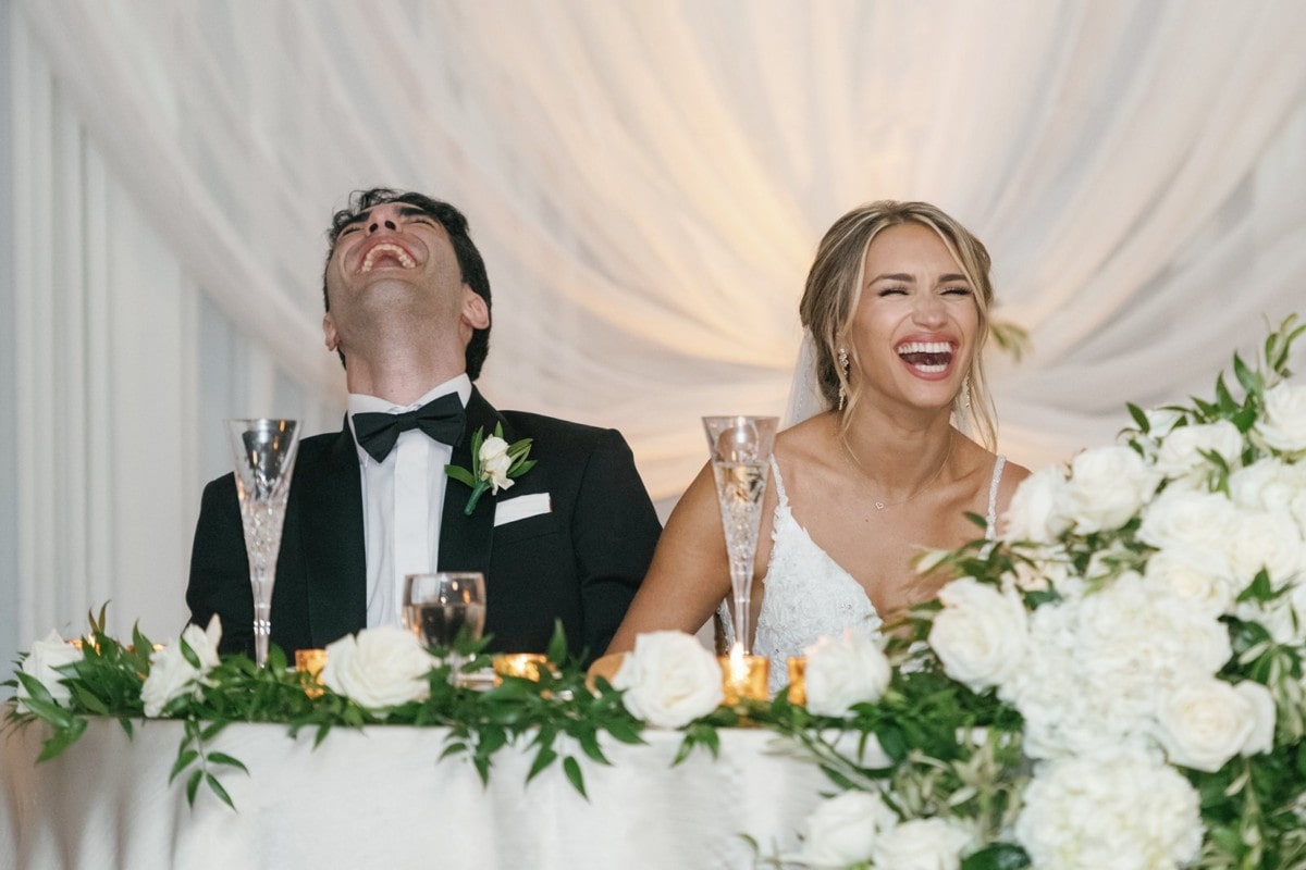 Bride and Groom laughing at Henry Hotel Dearborn