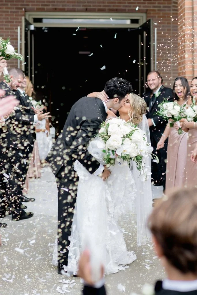 bride and groom kissing