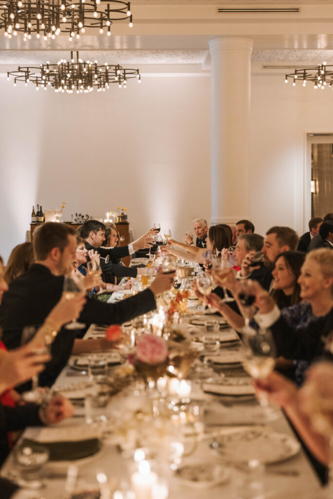 Shinola Wedding guests at long table in the Bixby Room